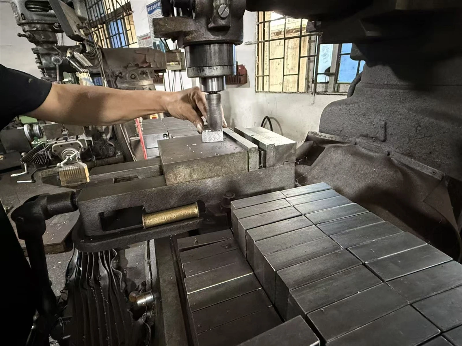 Drilling operation for binding machine components at FUDE